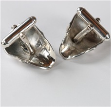 Revés gemelos plata calaveras