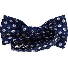Blue bow tie reverse with white daisies