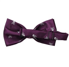 Reverse purple bow tie with skulls